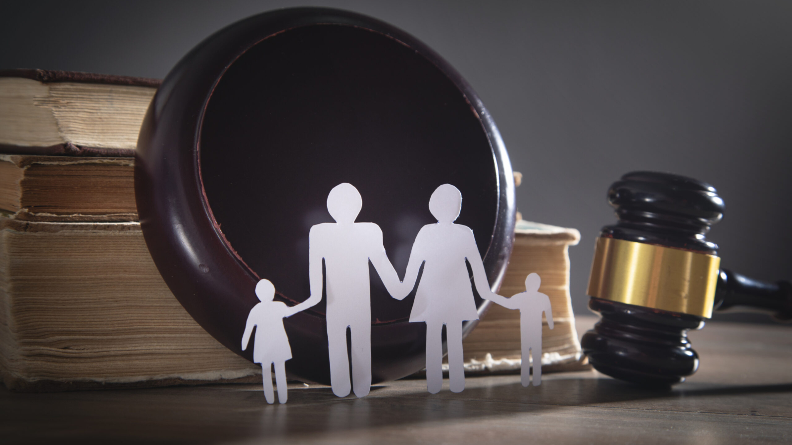 Paper cut family, judge gavel and book. Family Law